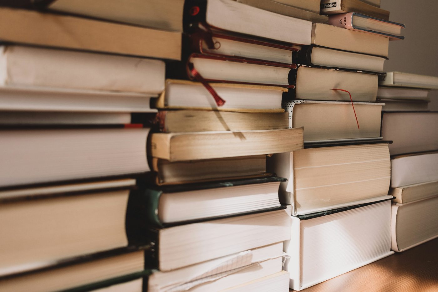 Stack of books, representing Houseago Properties Ltd's studious approach